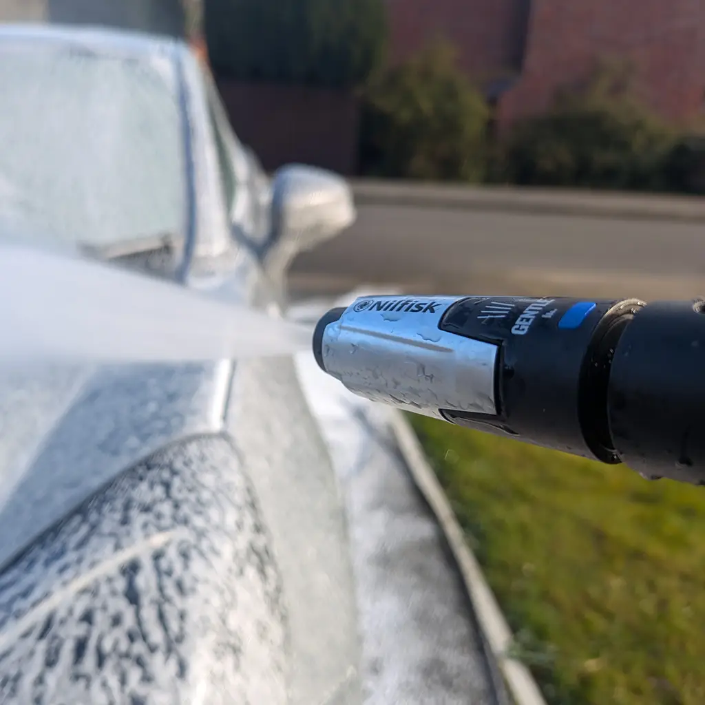 Nilfisk Premium 200 pressure washer used for car washing after three months testing