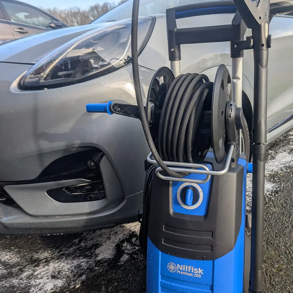 Nilfisk Premium 200 pressure washer used for car washing after three months testing