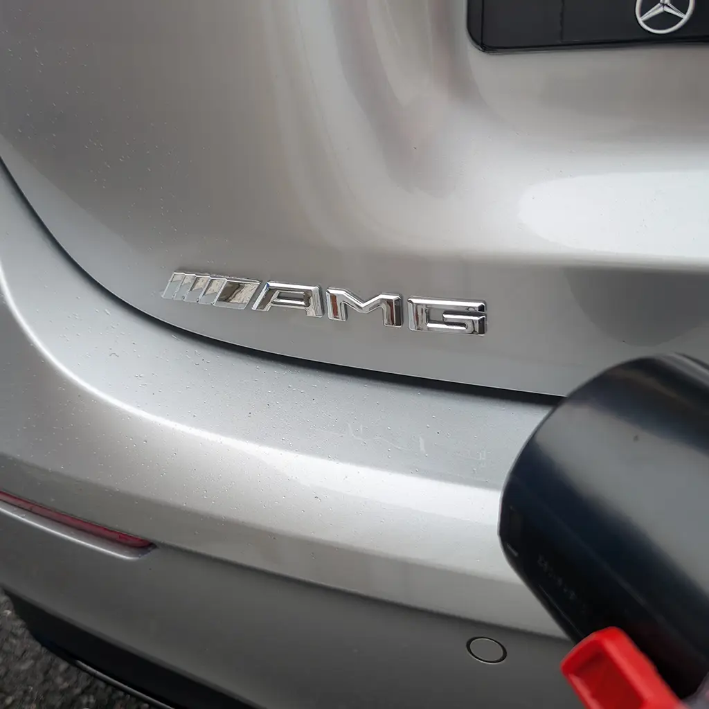 Webb cordless blower being used to dry a car after washing