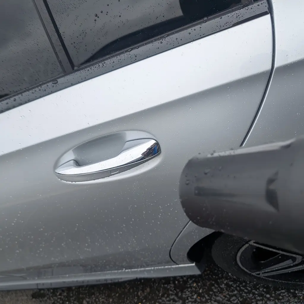 Webb cordless blower being used to dry a car after washing